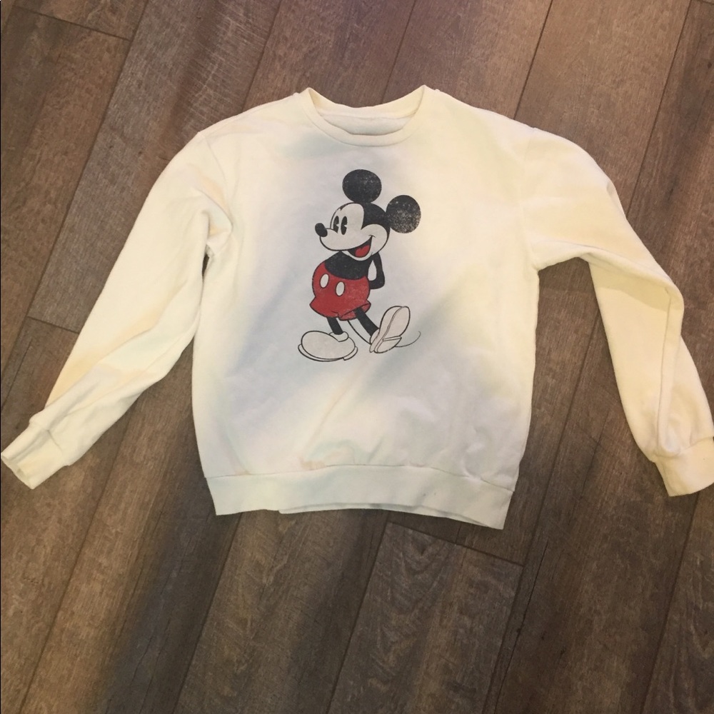 a white mickey mouse crew neck.